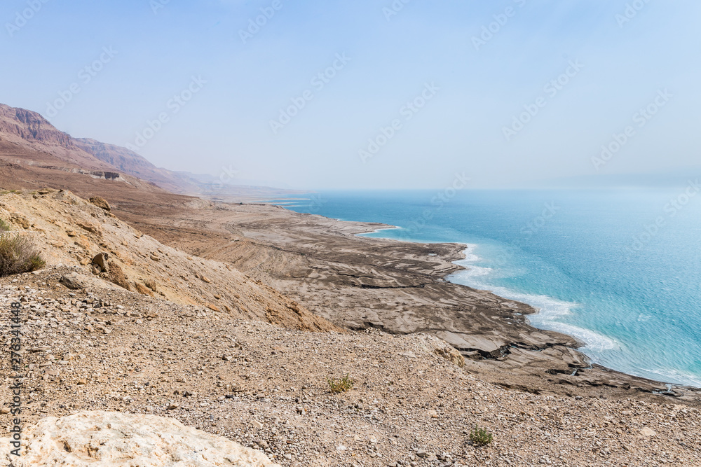 Panoramic  view of the coast of Dead Sea and mountains in the Judean Desert in the Dead Sea region in Israel