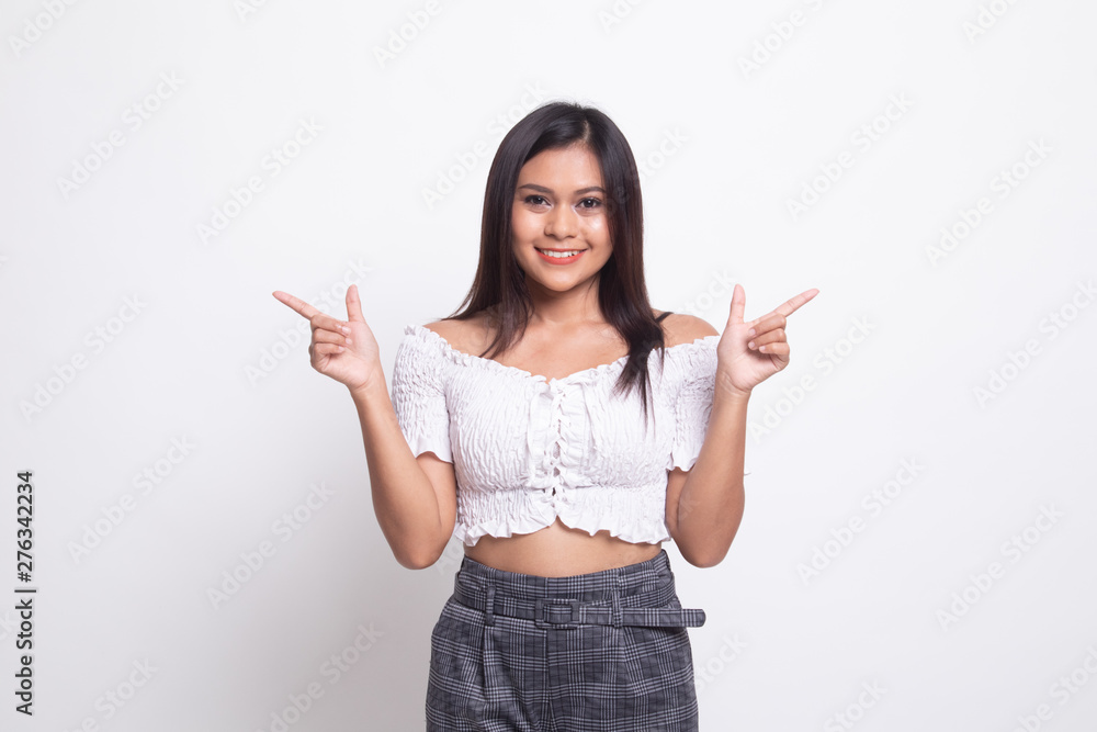Young Asian woman point to left and right. Young Asian woman point to left and right.