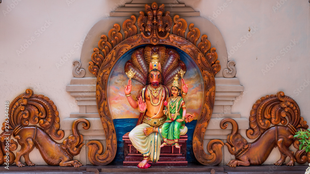 Colourful statues of Hindu religious deities in Hindu temple in Singapore	