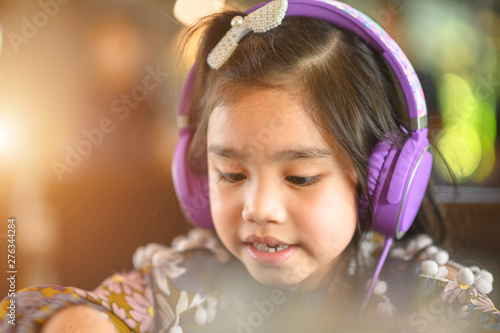 lifestyle Young asian girl relax listening to music in home