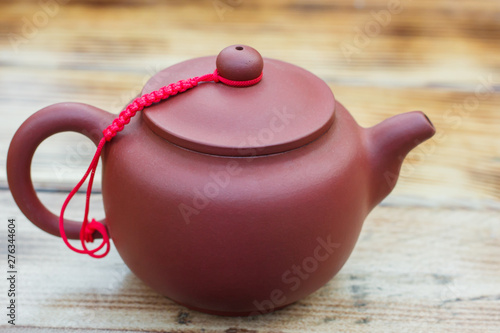 Wallpaper Mural Clay teapot on a wooden table. Torontodigital.ca