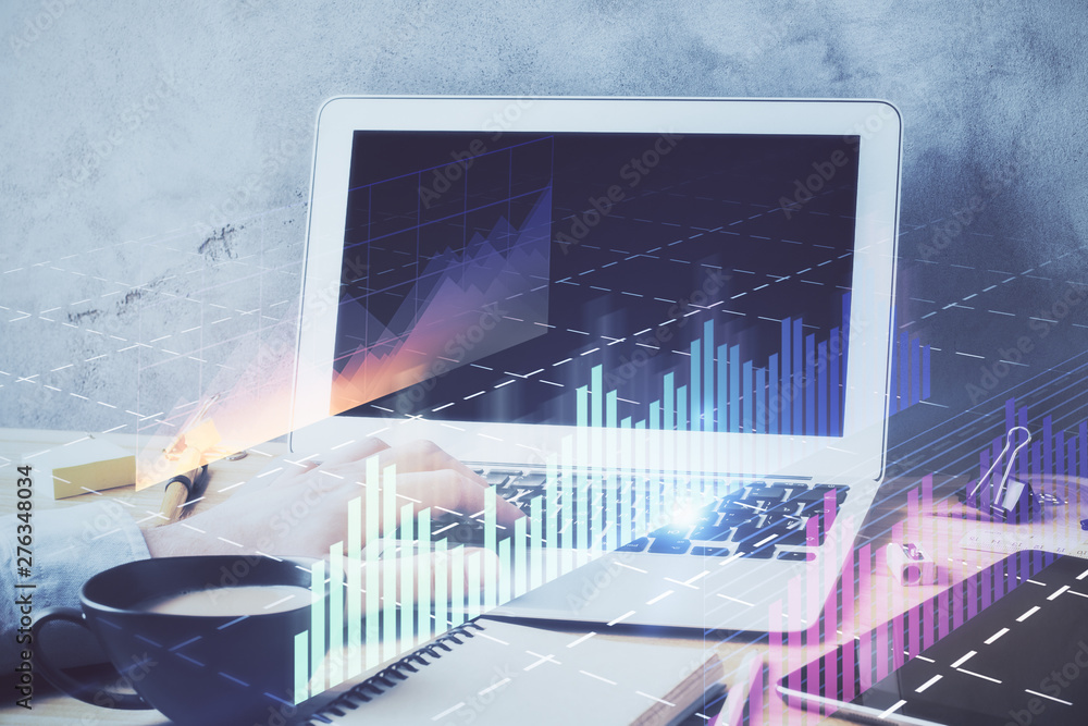 Forex graph with businessman working on computer in office on background. Concept of hardworking. Double exposure. Forex graph with businessman working on computer in office on background. Concept of hardworking. Double exposure.