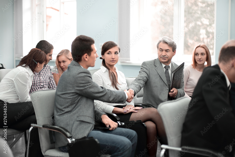 handshake colleagues in the conference room before the meeting handshake colleagues in the conference room before the meeting