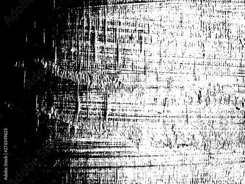 Dirty grunge background. The monochrome texture is old. Vintage worn pattern. The surface is covered with scratches.