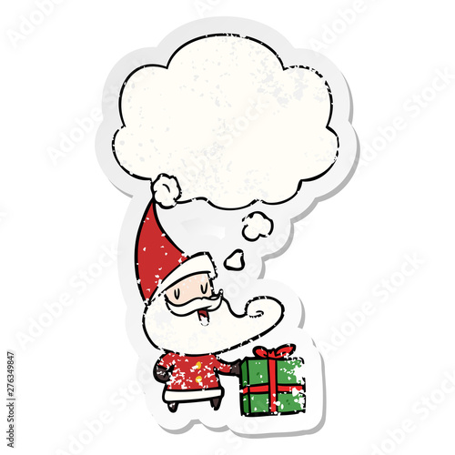 cartoon santa claus and thought bubble as a distressed worn sticker