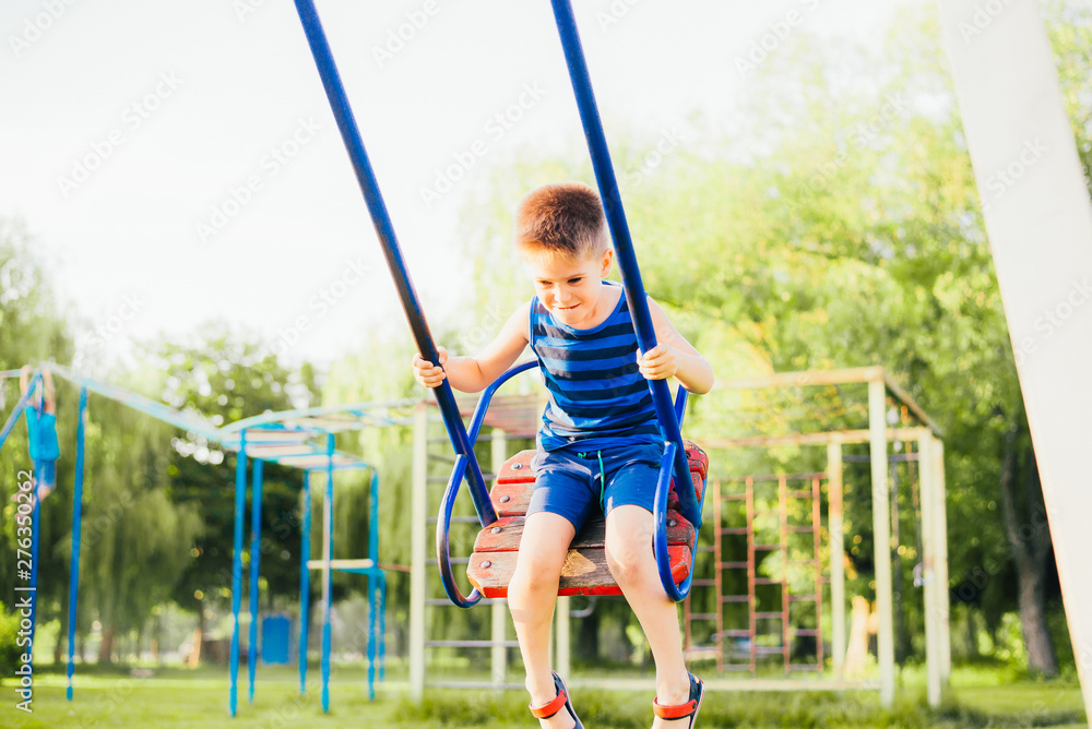 little boy on playground little boy on playground