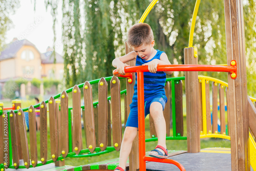 Fototapeta premium little boy on the playground