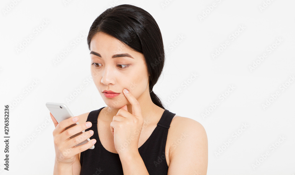 Close up - elegant beautiful asian girl talking with somebody on cellphone Close up - elegant beautiful asian girl talking with somebody on cellphone