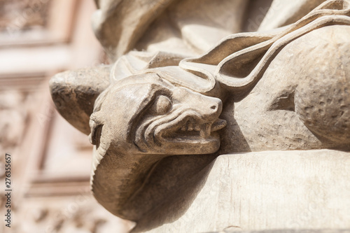 Snake under the Virgin foot, Leon Cathedral, Spain photo
