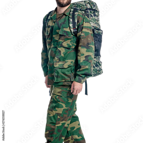 Man in military uniform, camouflage with backpack on white background isolation © Kabardins photo