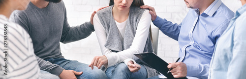 Fotografie People counseling desperate woman at group therapy session