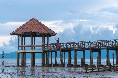 wooden bridge along the black beach..pavilion at black beach view point Trat Thailand