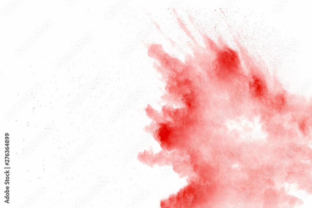 Explosion of red dust on white background.