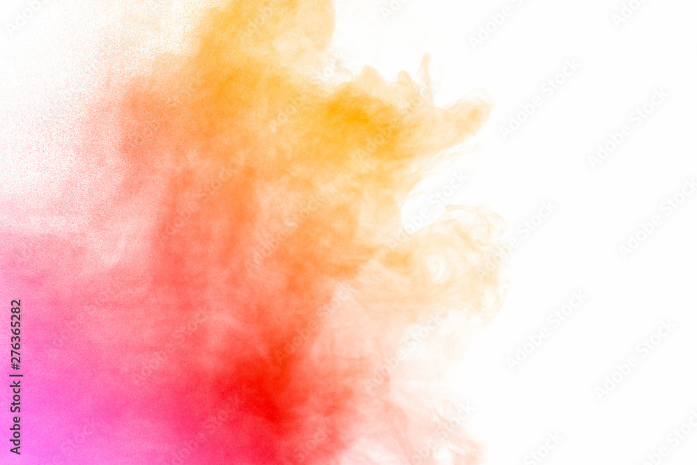 Fototapeta premium Explosion of multicolored dust on white background.