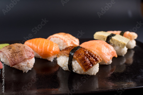 sashimi sushi set on black background