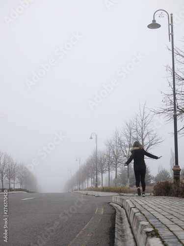 woman in the fog