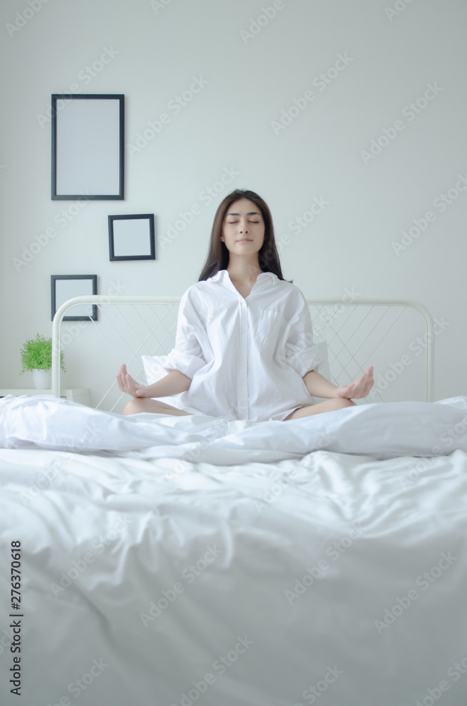 Simple yoga posture on the mattress. Simple yoga posture on the mattress.