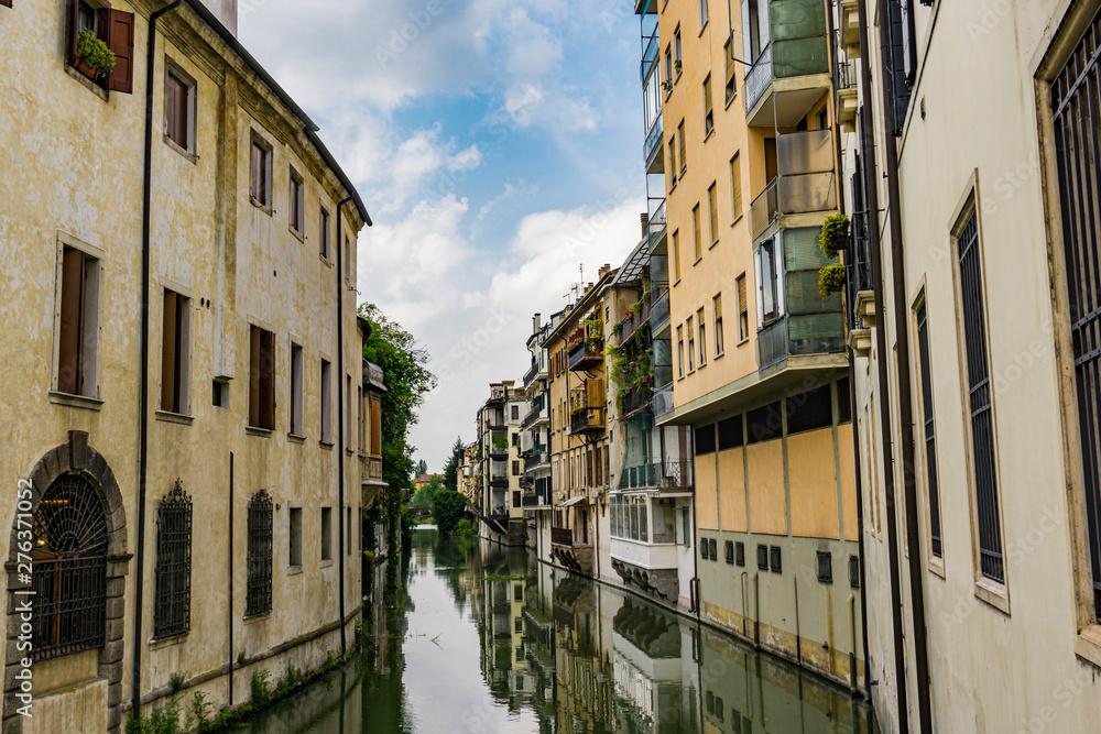 Water channel San Massimo runs among residential houses in the centre of the old city Padua, Italy