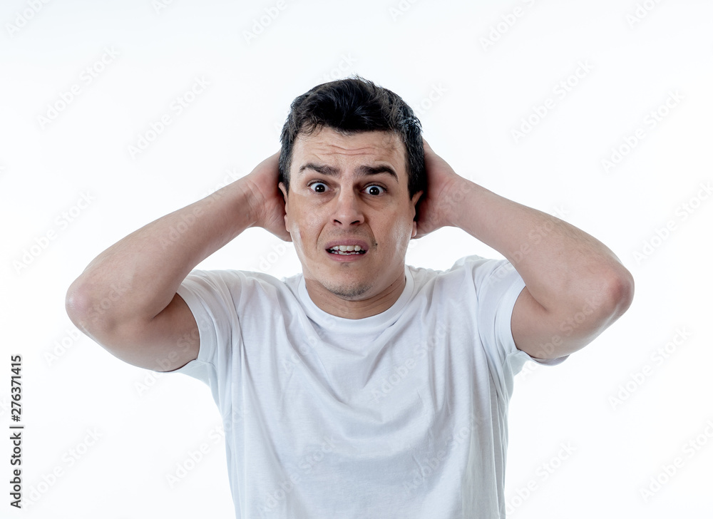Human expressions and emotions. Concern scared shocked adult man with a terrified facial expression Human expressions and emotions. Concern scared shocked adult man with a terrified facial expression