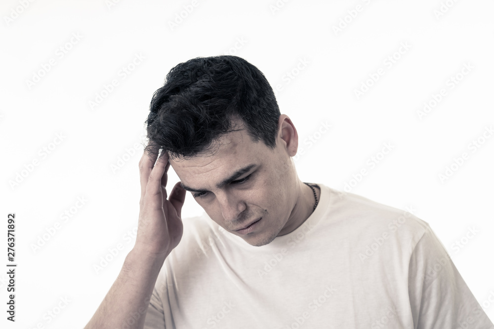 Portrait of sad and desperate handsome man feeling depressed in Facial expressions and depression Portrait of sad and desperate handsome man feeling depressed in Facial expressions and depression
