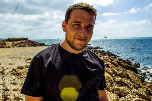 man on the beach by the sea