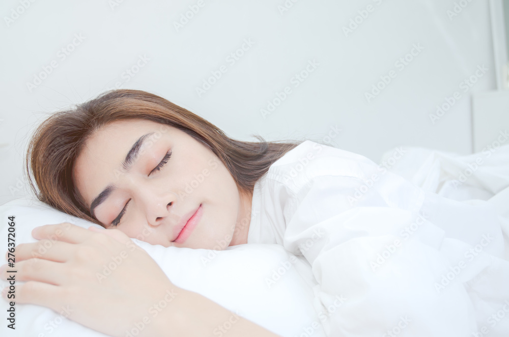 Women wearing white pajamas are resting. Women wearing white pajamas are resting.