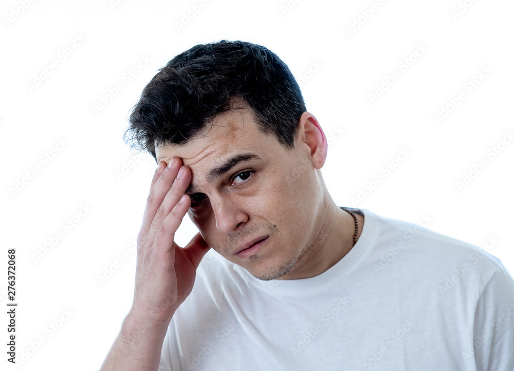 Portrait of sad and desperate handsome man feeling depressed in Facial expressions and depression Portrait of sad and desperate handsome man feeling depressed in Facial expressions and depression