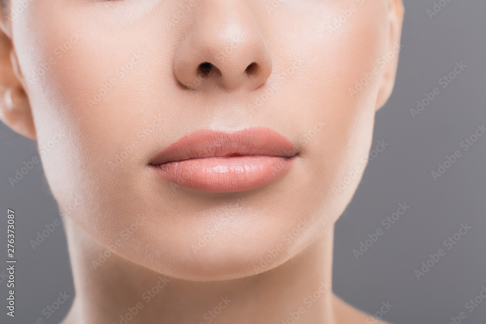 Close up of perfect female lips, permanent makeup concept