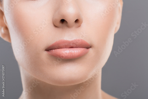 Close up of perfect female lips, permanent makeup concept