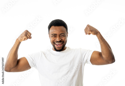 Close up portrait of funny strong smiling and laughing attractive man in happy face and fitness.