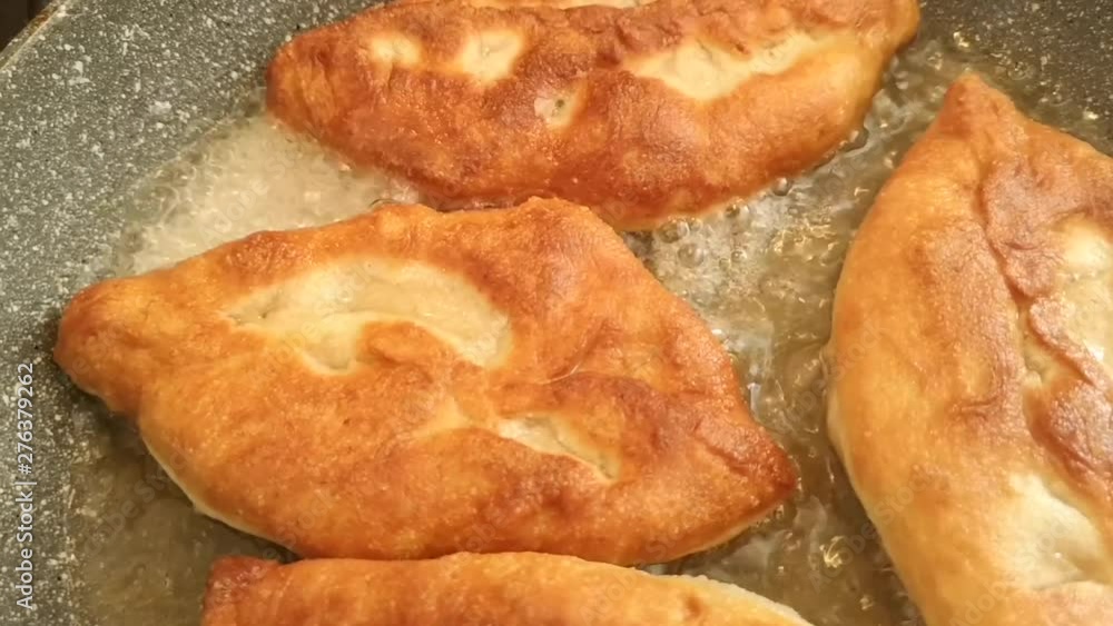 Potato patties are fried in a pan Potato patties are fried in a pan