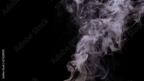 White smoke overlay effect on solid super black background. Nature motion smoky steam wave abstract environment. Concept of: Pollution, Cloud, Cigarette, Gas, Dry Ice, Chemistry, Steam, Hot, Tea.