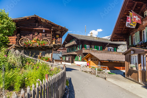Obraz na płótnie Traditional wodden house in Murren, a traditional Walser mountain village in the Bernese Highlands of Switzerland. w salonie