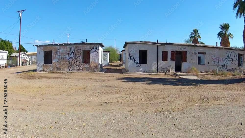 Driving By Abandoned Dilapidated Apartments In Small Desert Town Driving By Abandoned Dilapidated Apartments In Small Desert Town