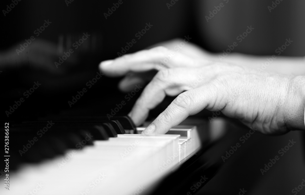 Fototapeta premium Man playing the piano