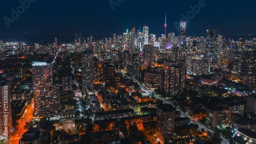 Wallpaper Mural 4K Timelapse Sequence of Toronto, Canada – Toronto’s skyline from blue hour to night from a rooftop overlooking the city with traffic moving through the scene Torontodigital.ca