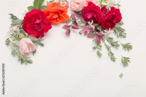 rose flowers and leaves on white background