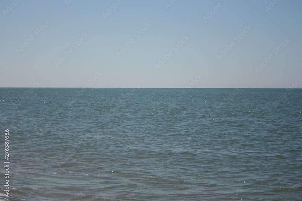 Sea with clear water at spanish beach Huelva