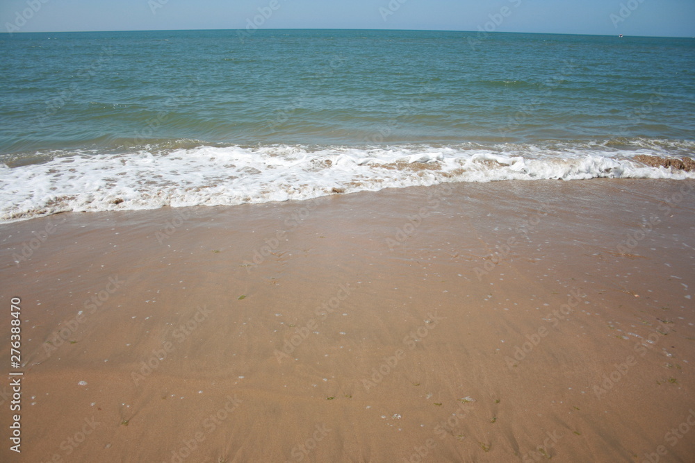 Spanish beach , water with waves at summer Spanish beach , water with waves at summer