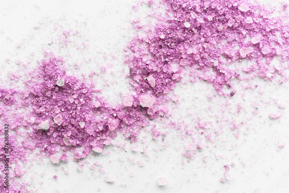 sea salt bath with lavender scattered on a white background sea salt bath with lavender scattered on a white background