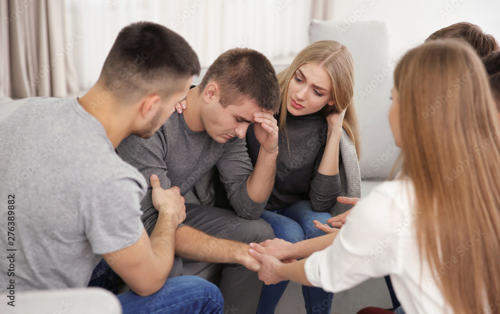 Young people during group therapy, indoors