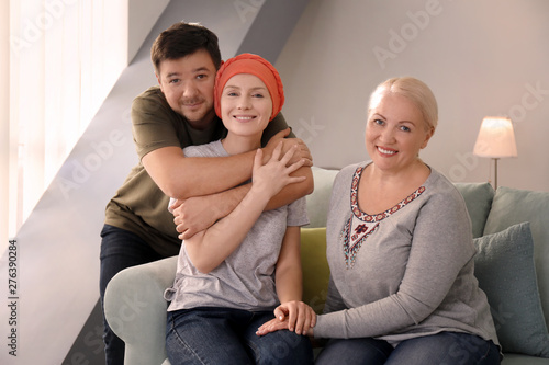 Family visiting young woman...