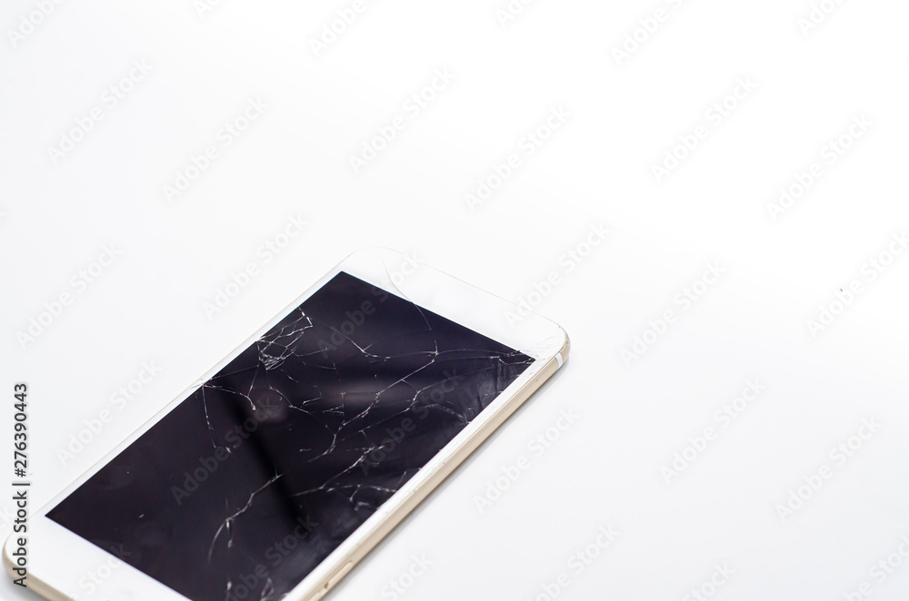 Phone, broken phone or broken screen Place isolated with a white background. Phone, broken phone or broken screen Place isolated with a white background.
