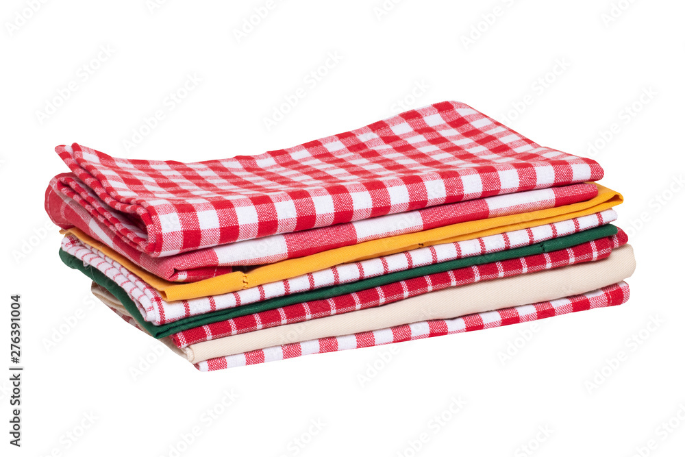 Kitchen towels isolated. Close-up of a stack of red white checkered and striped tableclothes or napkins isolated on a white background. Macro. Kitchen towels isolated. Close-up of a stack of red white checkered and striped tableclothes or napkins isolated on a white background. Macro.