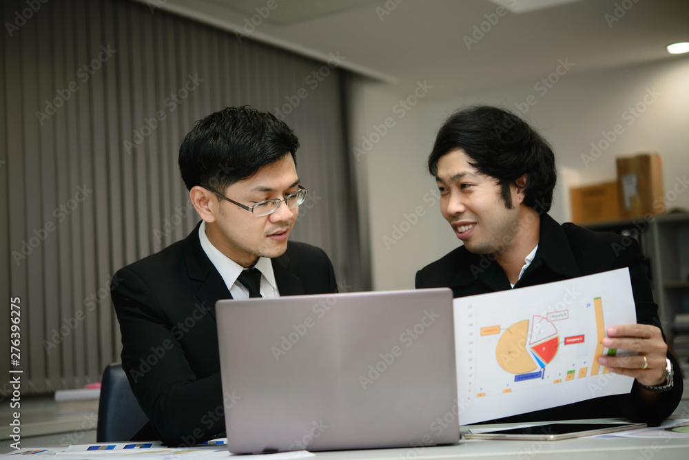 Two Asian businessmen success concept,Thailand employee happy from work finished Two Asian businessmen success concept,Thailand employee happy from work finished