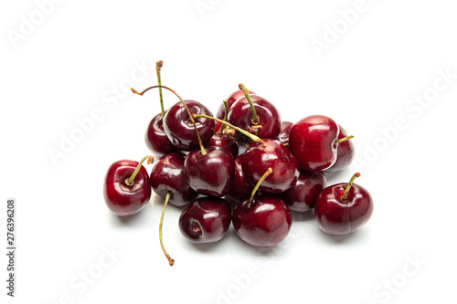 Red cherries isolated on white background
