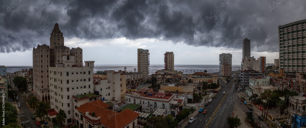 Aerial Panoramic view of the Havana City, Capital of Cuba, during a dramatic storm cloud.