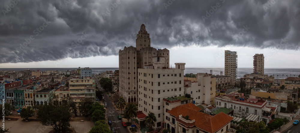 Aerial Panoramic view of the Havana City, Capital of Cuba, during a dramatic storm cloud.