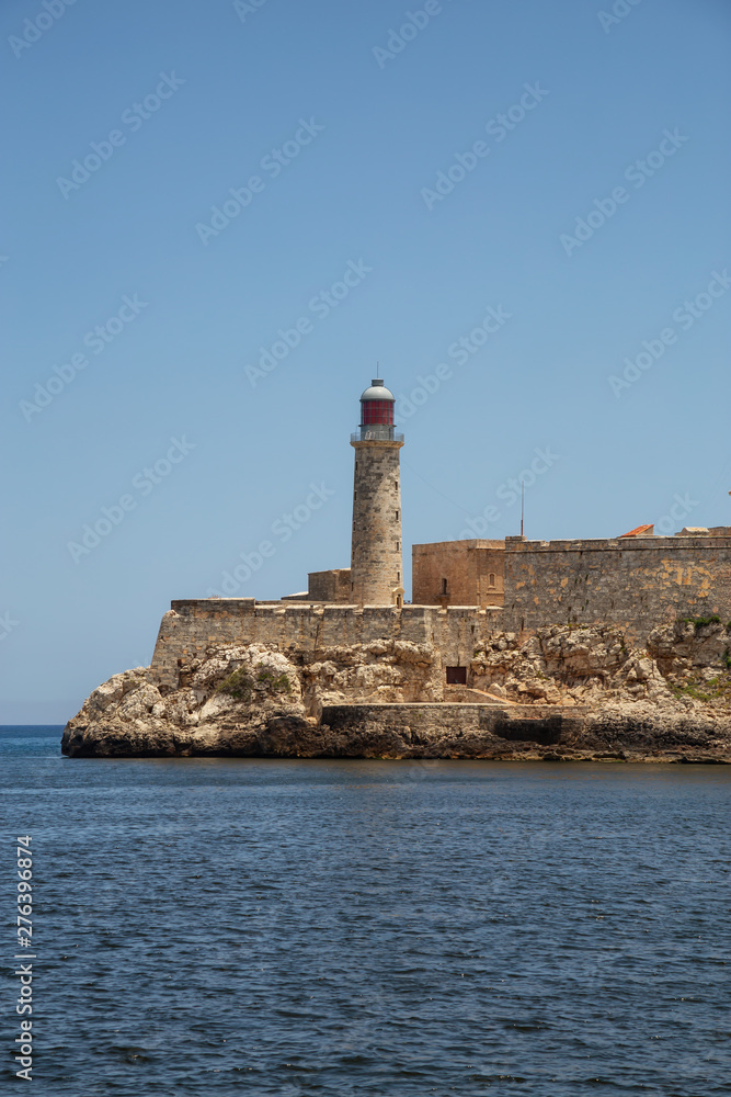 Beautiful view of the Lighthouse in the Old Havana City, Capital of Cuba, during a vibrant sunny day.