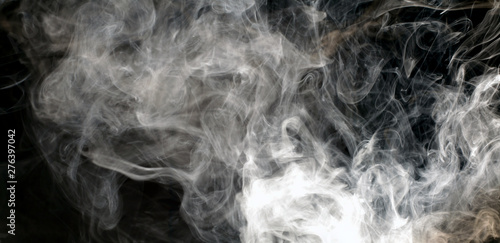 White smoke blot on Black. Abstract background.
